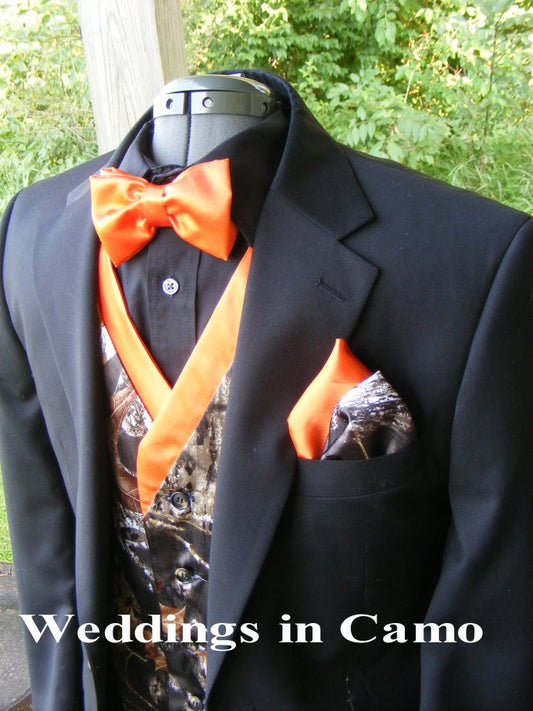 Men's camo vest shown with a tux jacket and accessories