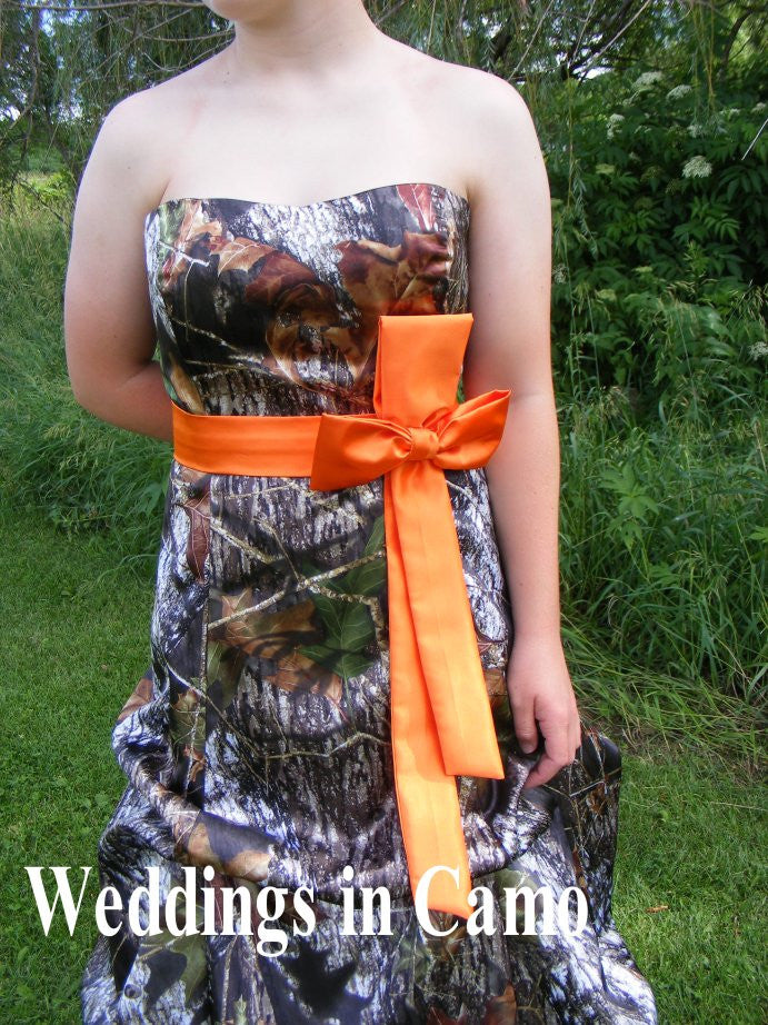 camo wedding dress with pickups shown in Mossy Oak with accent of Orange