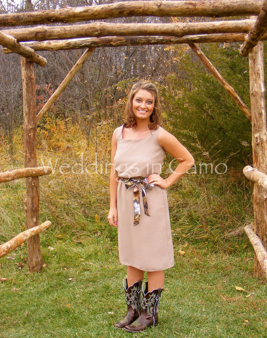 short bridesmaid dress shown with boots