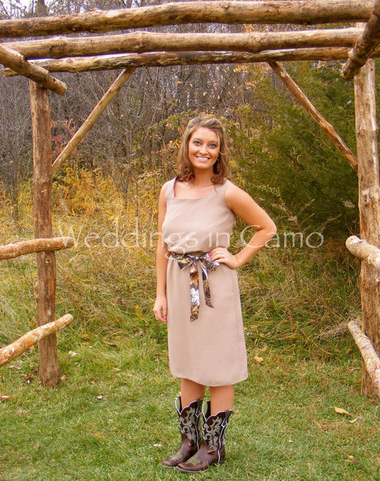 short bridesmaid dress shown with boots